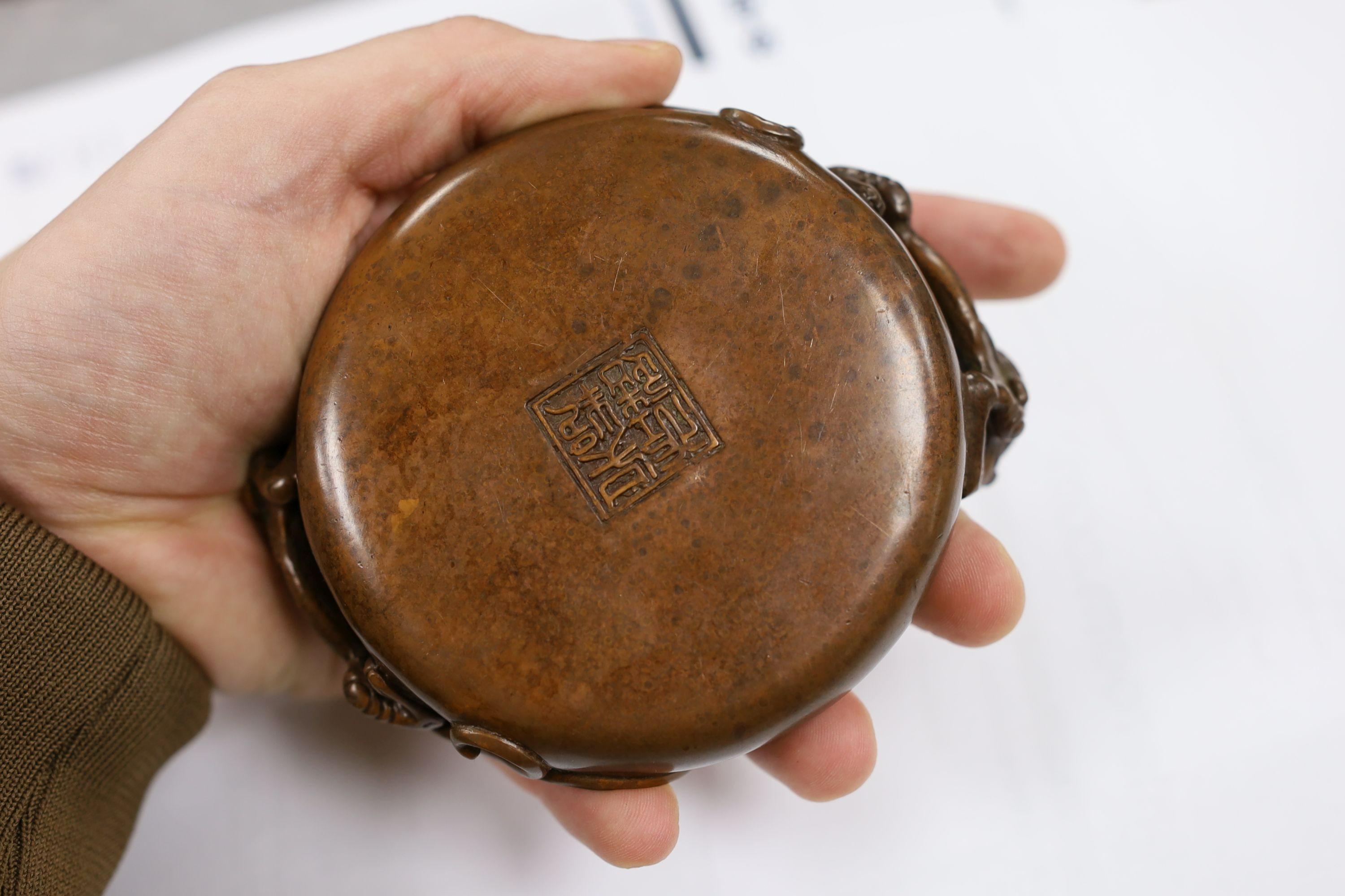 Two Chinese bronze censers, largest 11cms diameter